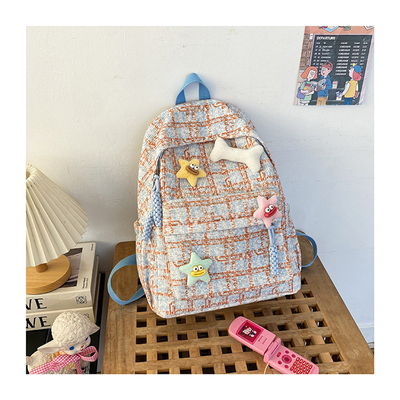 Kleine frische Schecktasche, Junior High-School-Rucksack, College-Studentinnen, Herbst- und Winter-Rucksack.